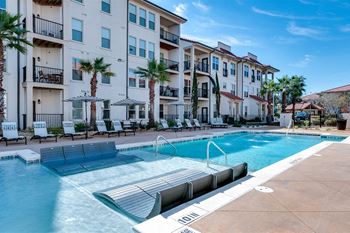 In water tanning ledge at Two Addison Place Apartments , Pooler, 31322